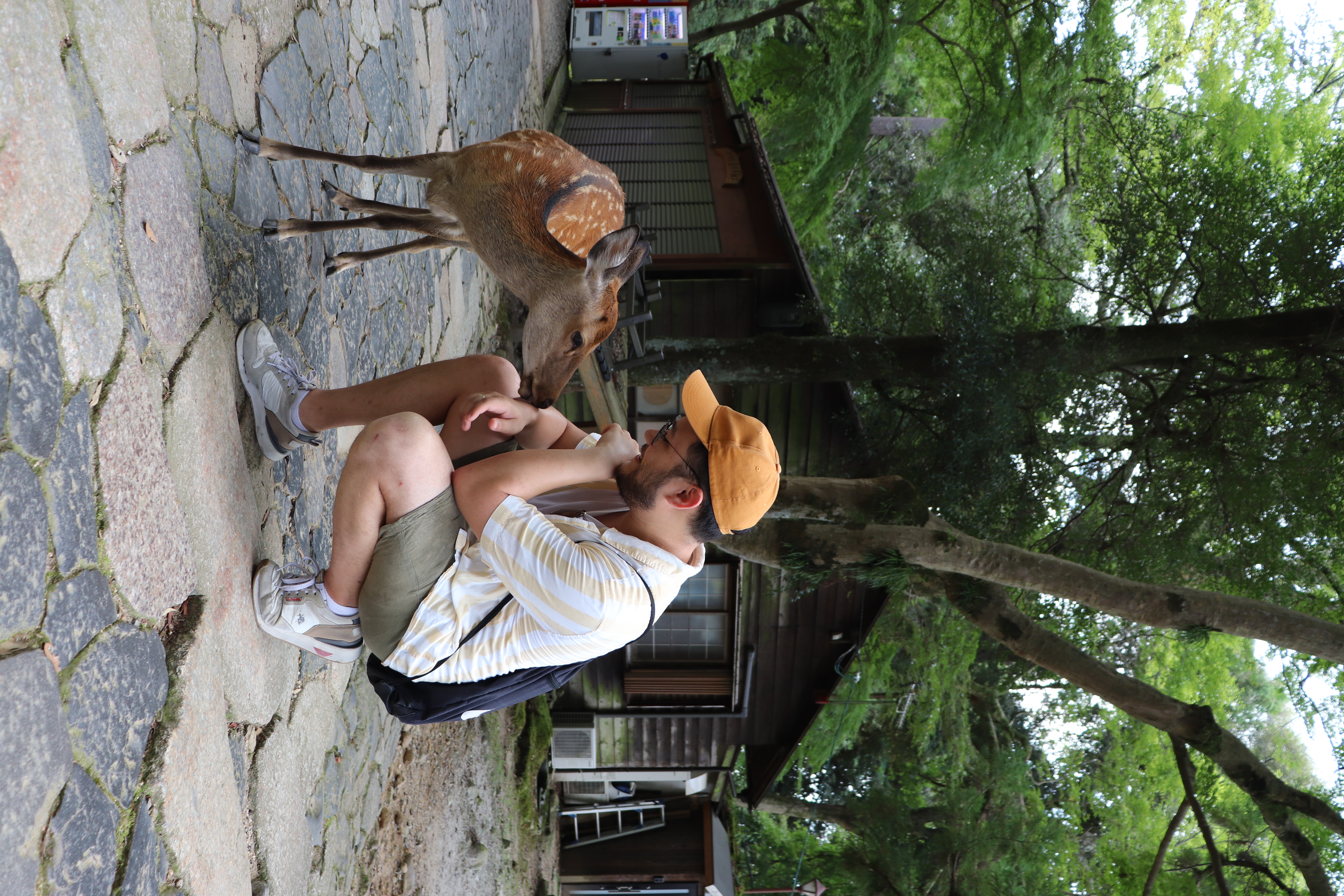 Picture of Anthony petting a deer